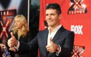 simon cowell thumbs up